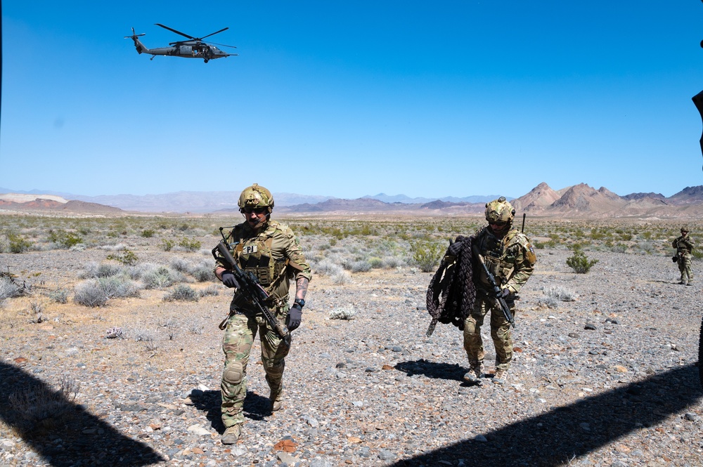 Airmen from the 88th TES and 413th FLTS conduct combat rescue training