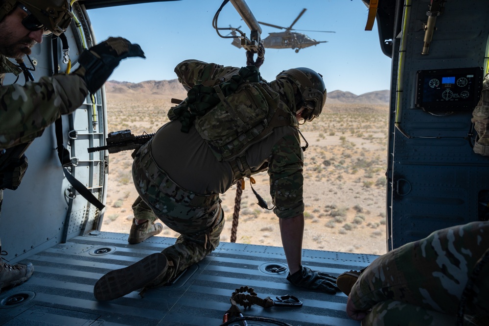 Airmen from the 88th TES and 413th FLTS conduct combat rescue training