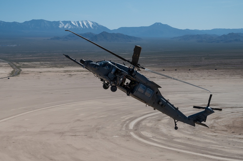 Airmen from the 88th TES and 413th FLTS conduct combat rescue training