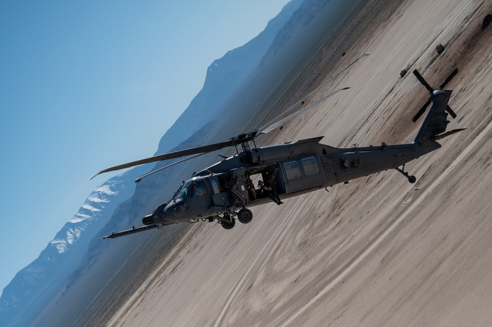 Airmen from the 88th TES and 413th FLTS conduct combat rescue training