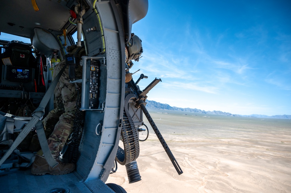 Airmen from the 88th TES and 413th FLTS conduct combat rescue training