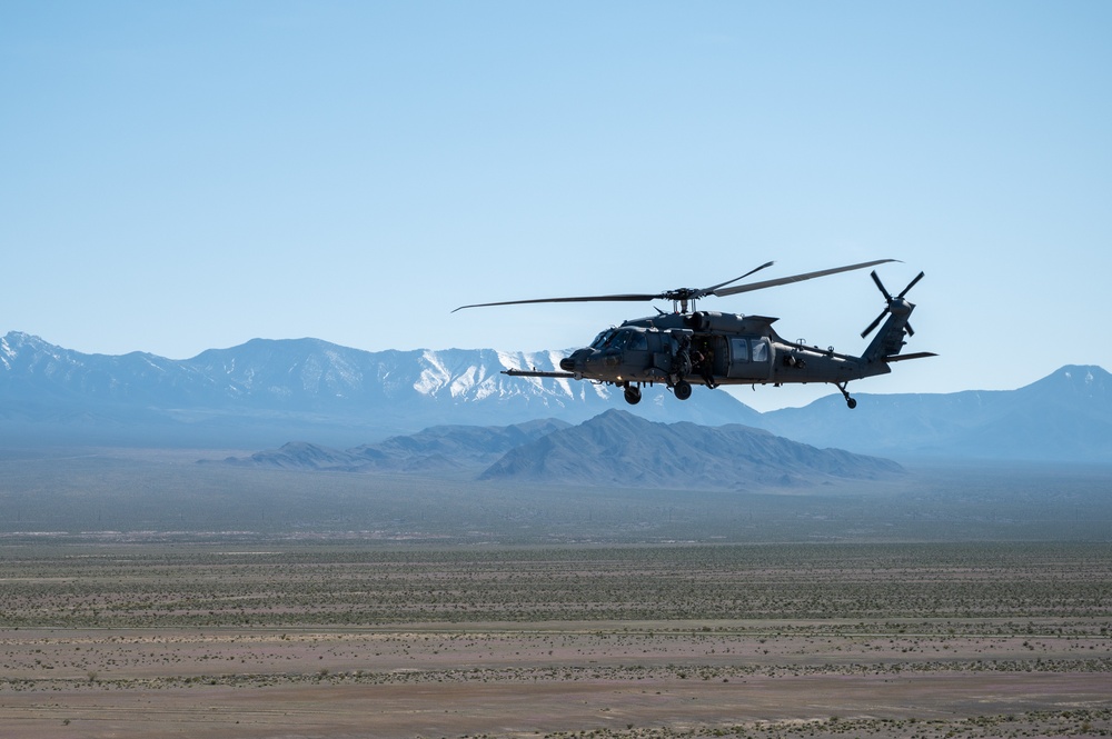 Airmen from the 88th TES and 413th FLTS conduct combat rescue training