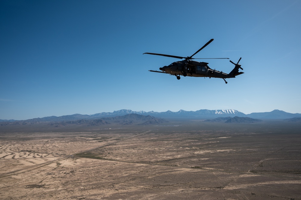 Airmen from the 88th TES and 413th FLTS conduct combat rescue training