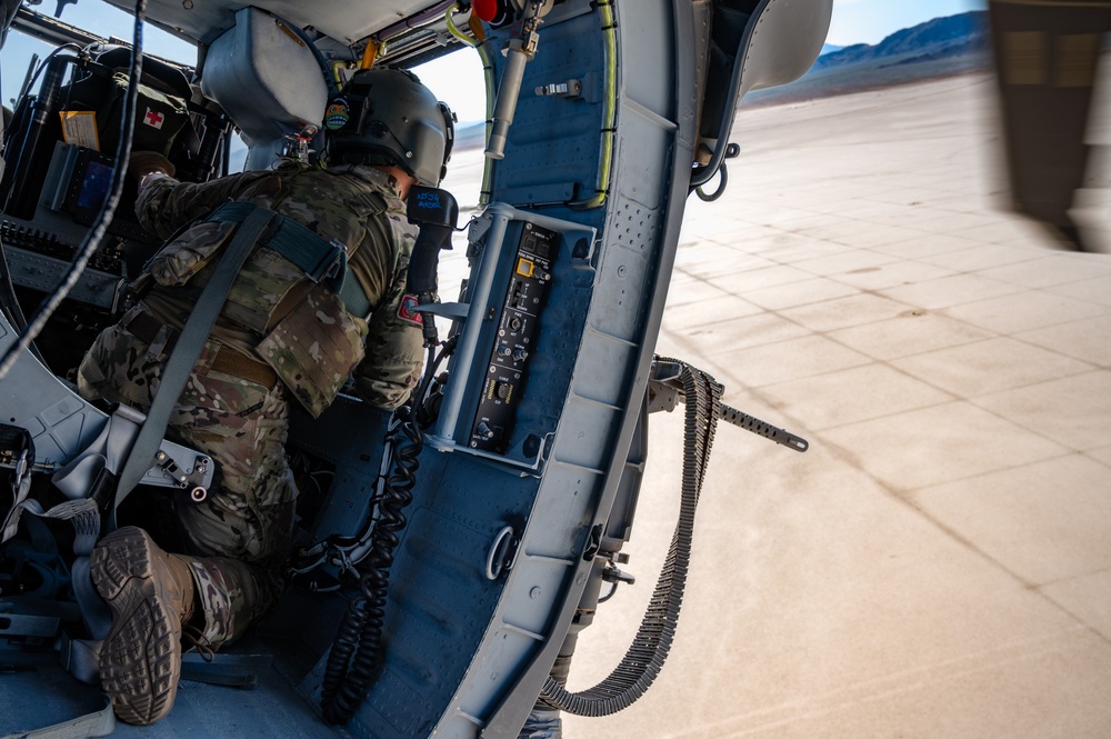 Airmen from the 88th TES and 413th FLTS conduct combat rescue training