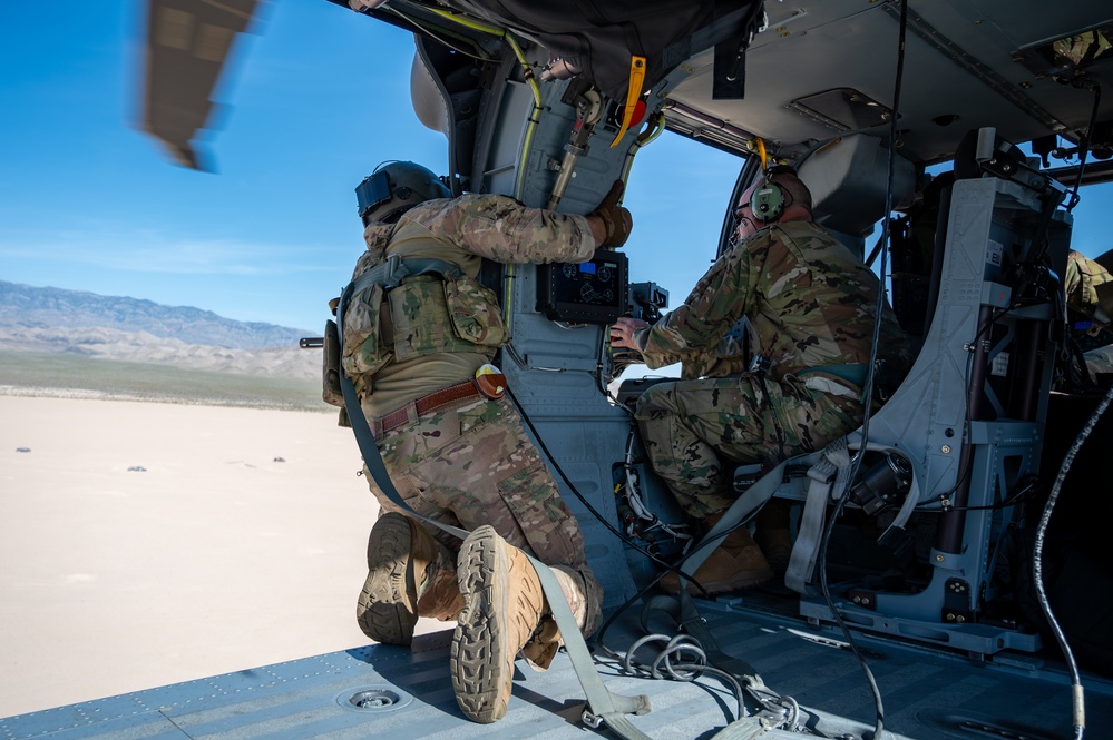 Airmen from the 88th TES and 413th FLTS conduct combat rescue training