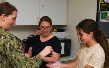White Oak high school students in the applied health sciences course visit the Naval Medical Center Camp Lejeune pharmacy