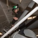 Sailors conduct aircraft maintenance aboard Abraham Lincoln