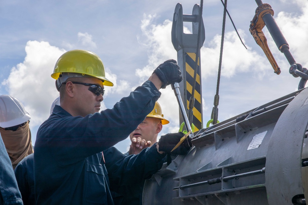 USS Emory S. Land Simulates Weapons Handling in Saipan
