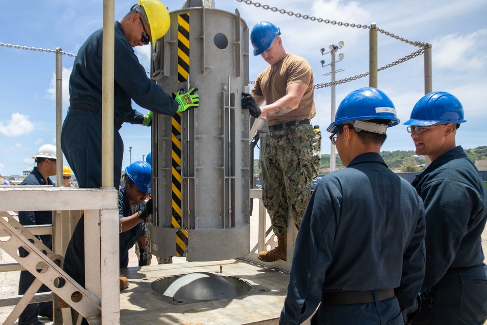USS Emory S. Land Simulates Weapons Handling in Saipan