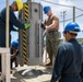 USS Emory S. Land Simulates Weapons Handling in Saipan