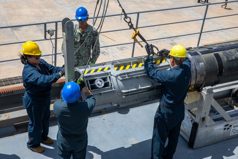 USS Emory S. Land Simulates Weapons Handling in Saipan