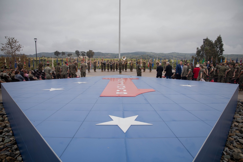 U.S. Marines with 1st MARDIV hold morning colors ceremony