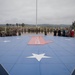 U.S. Marines with 1st MARDIV hold morning colors ceremony
