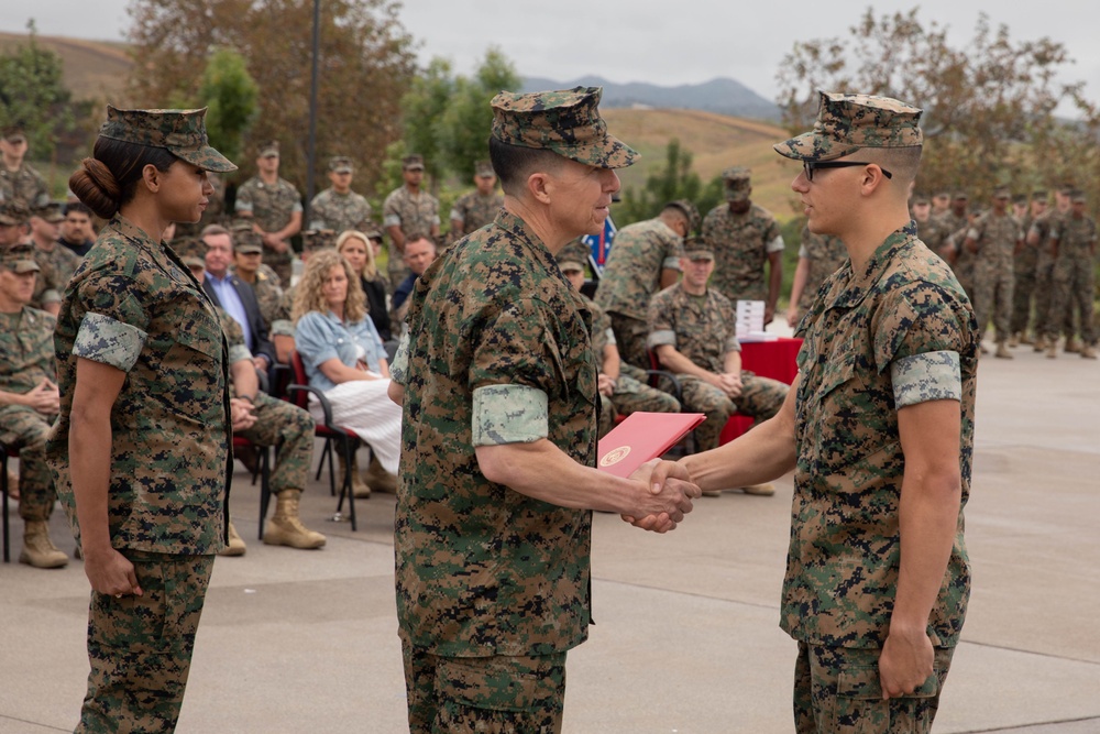 U.S. Marines with 1st MARDIV hold morning colors ceremony