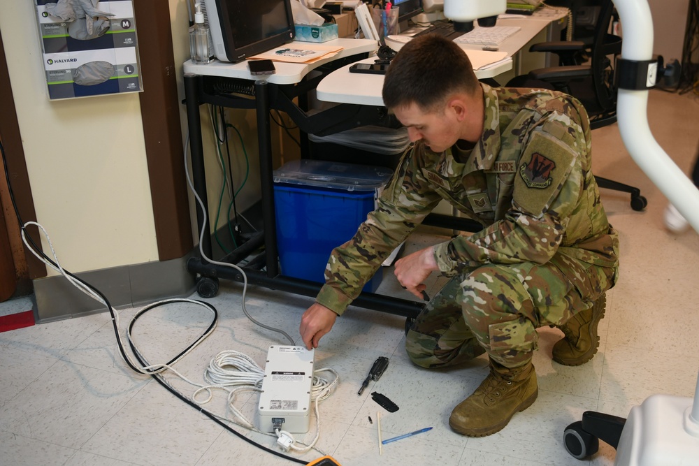 Air National Guardsmen gains experience repairing biomedical equipment at TAMC