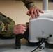 Air National Guardsmen gains experience repairing biomedical equipment at TAMC