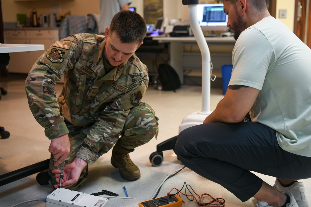 Air National Guardsmen gains experience repairing biomedical equipment at TAMC