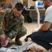 Air National Guardsmen gains experience repairing biomedical equipment at TAMC