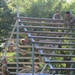 Redleg Soldiers weave through obstacle course