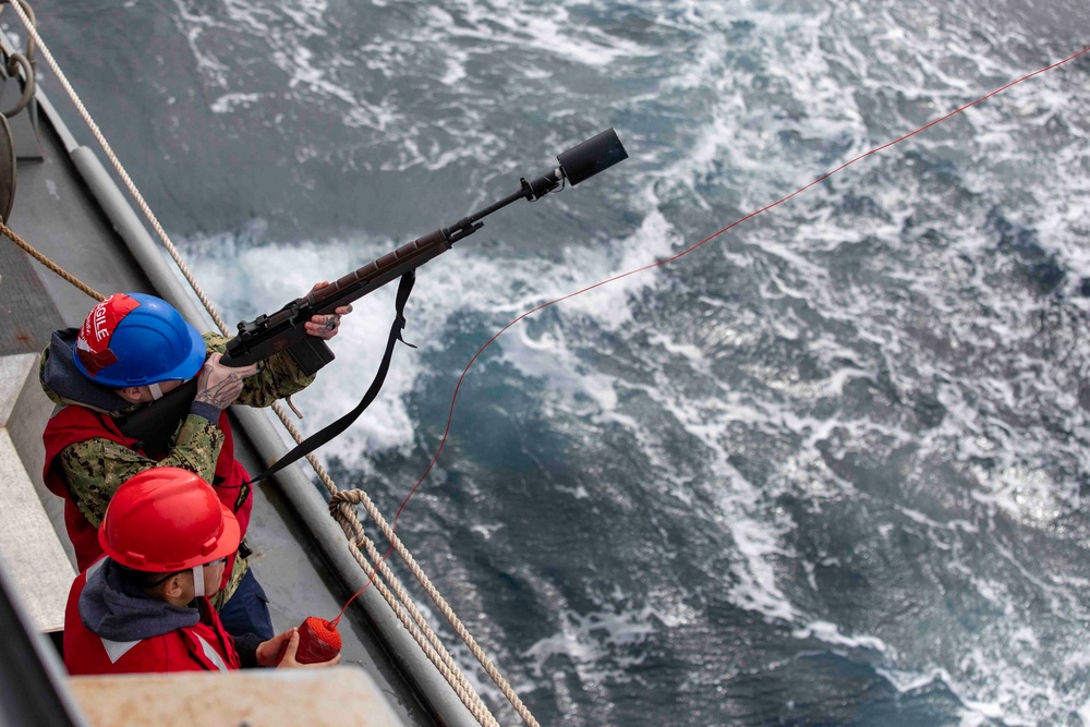 USS Ralph Johnson Conducts Replenishment at Sea.