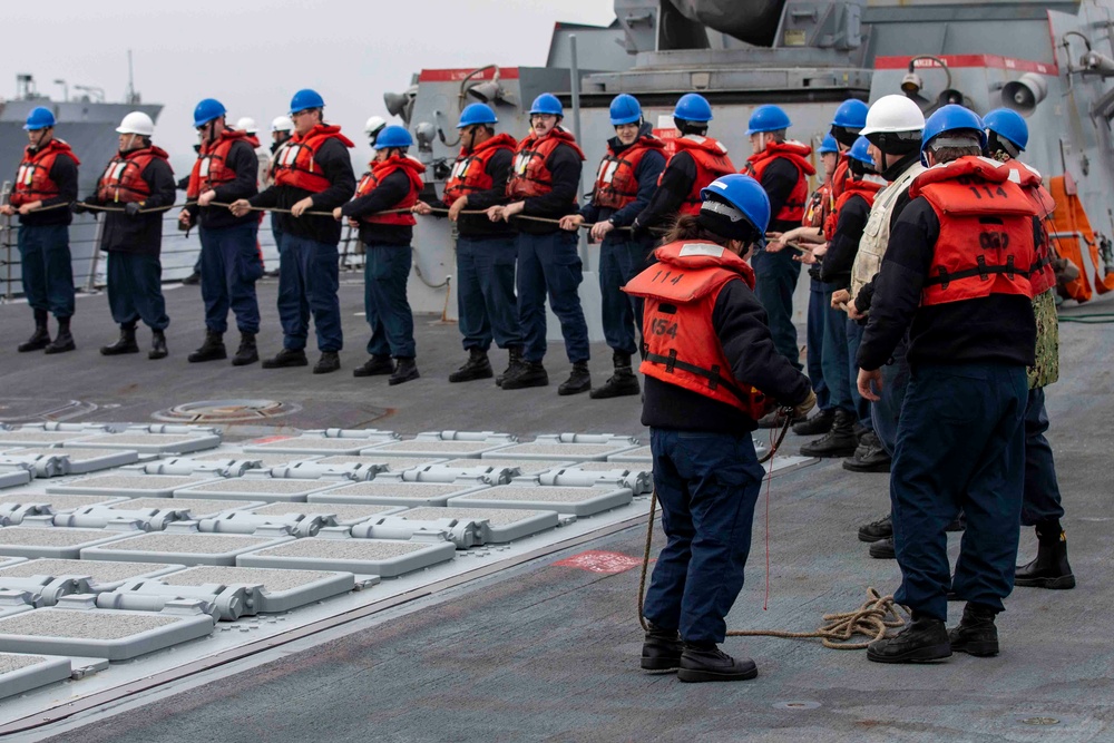 USS Ralph Johnson Conducts Replenishment at Sea.