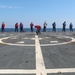 Sailors aboard the USS Howard conduct flight quarters in the North Pacific Sea