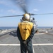 Sailors aboard the USS Howard conduct flight quarters in the North Pacific Sea