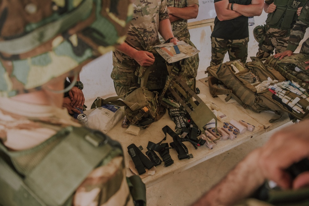 Members from the Royal Moroccan Armed Forces attend a Tactical Combat Casualty Course presentation led by the Norwegian Special Operation Forces during Flintlock 24