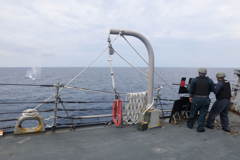 Sailors aboard the USS Howard conduct a live fire exercise in the North Pacific Ocean