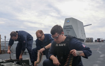 Sailors aboard the USS Howard conduct a live fire exercise in the North Pacific Ocean