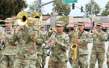 An Army reserve Soldier marches to a variety of tunes