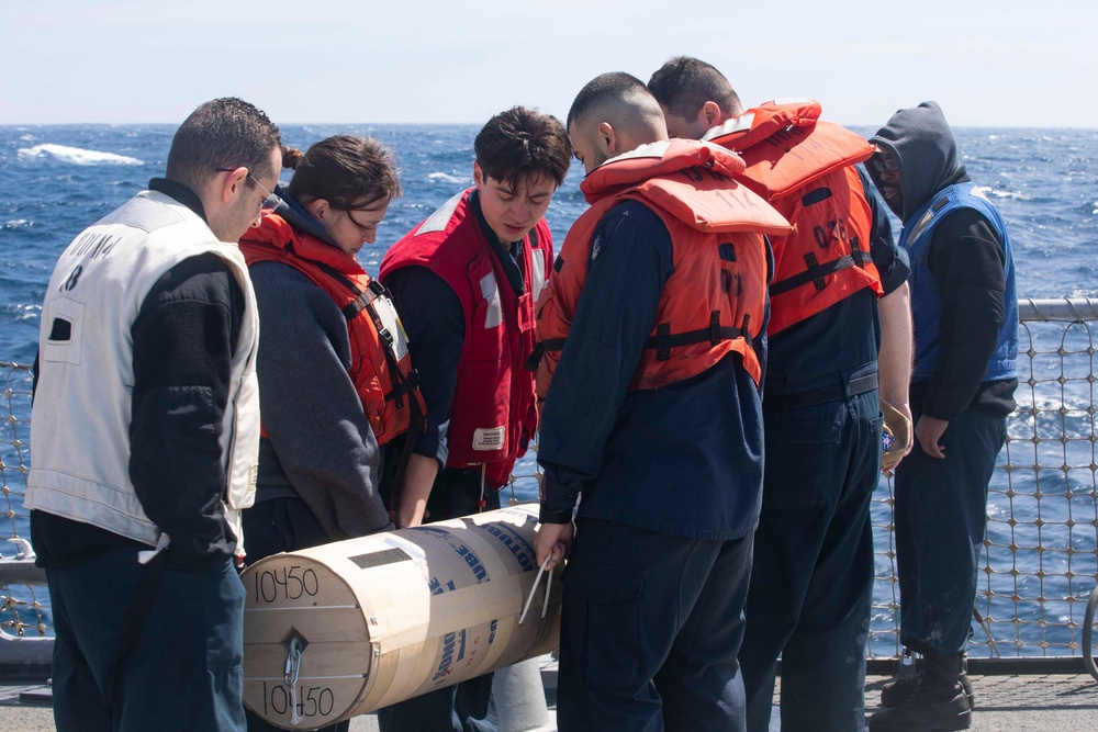 USS Ralph Johnson launches buoy