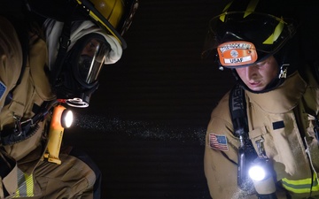 Deployed firefighters complete low-light fire rescue training