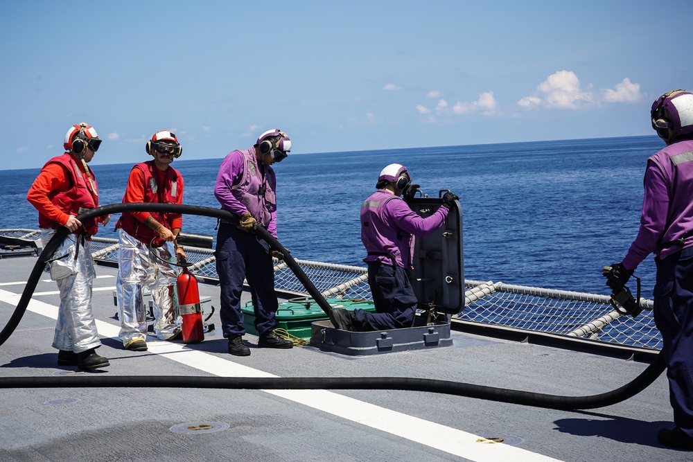 USS Gabrielle Giffords (LCS 10) conducts flight operations at sea