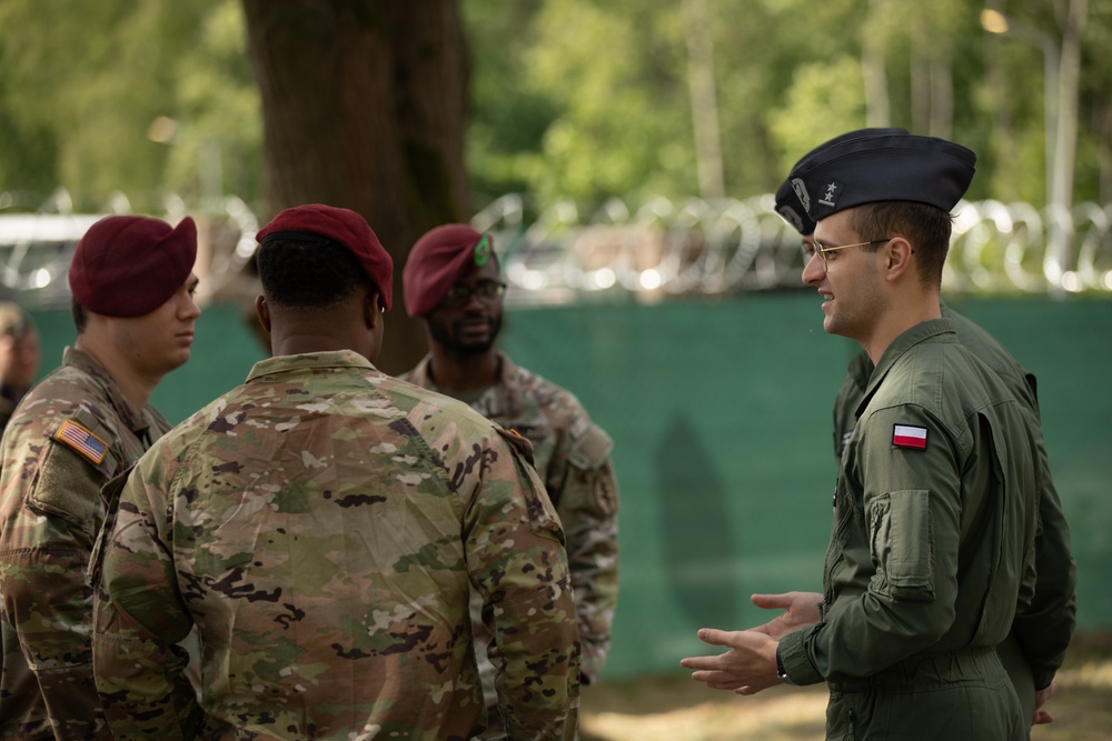 Dignitaries, members of 10th Special Forces Group (Airborne), Polish special forces, 6th Airborne Brigade, gather for the renaming of Camp Miron, May 17, 2024 near Krakow Poland.