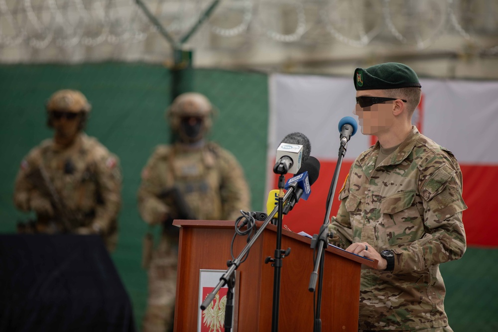 Dignitaries, members of 10th Special Forces Group (Airborne), Polish special forces, 6th Airborne Brigade, gather for the renaming of Camp Miron, May 17, 2024 near Krakow Poland.