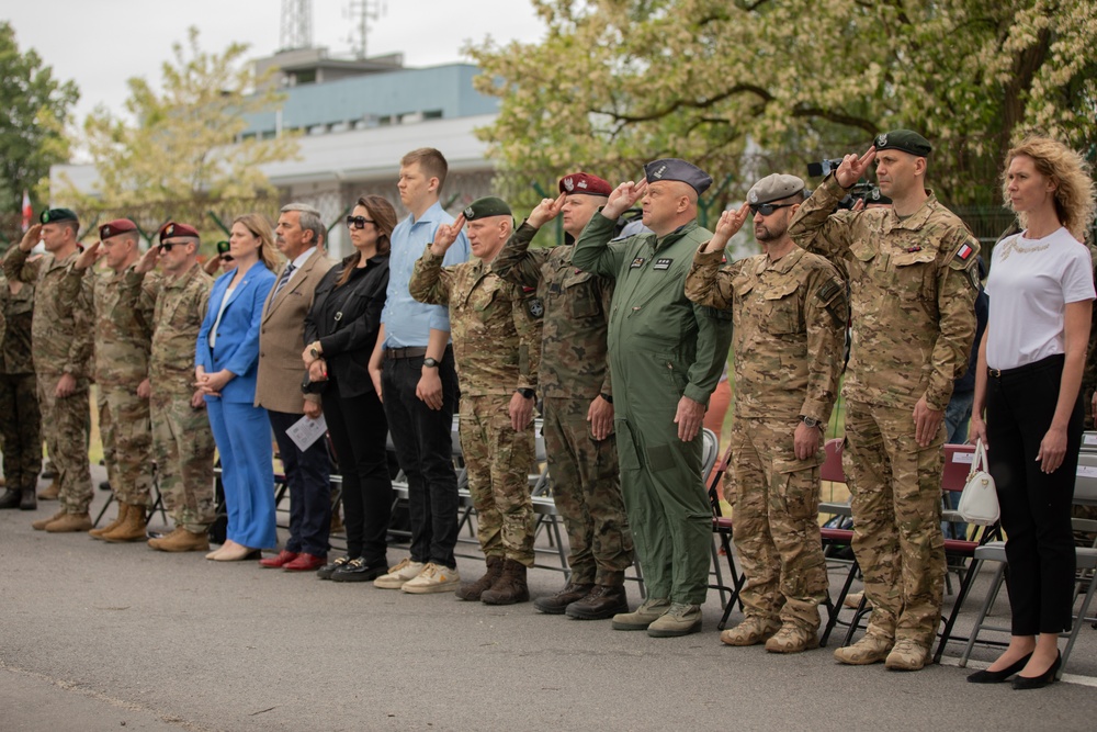 Dignitaries, members of 10th Special Forces Group (Airborne), Polish special forces, 6th Airborne Brigade, gather for the renaming of Camp Miron, May 17, 2024 near Krakow Poland.