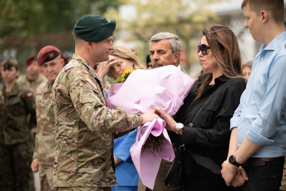 Dignitaries, members of 10th Special Forces Group (Airborne), Polish special forces, 6th Airborne Brigade, gather for the renaming of Camp Miron, May 17, 2024 near Krakow Poland.