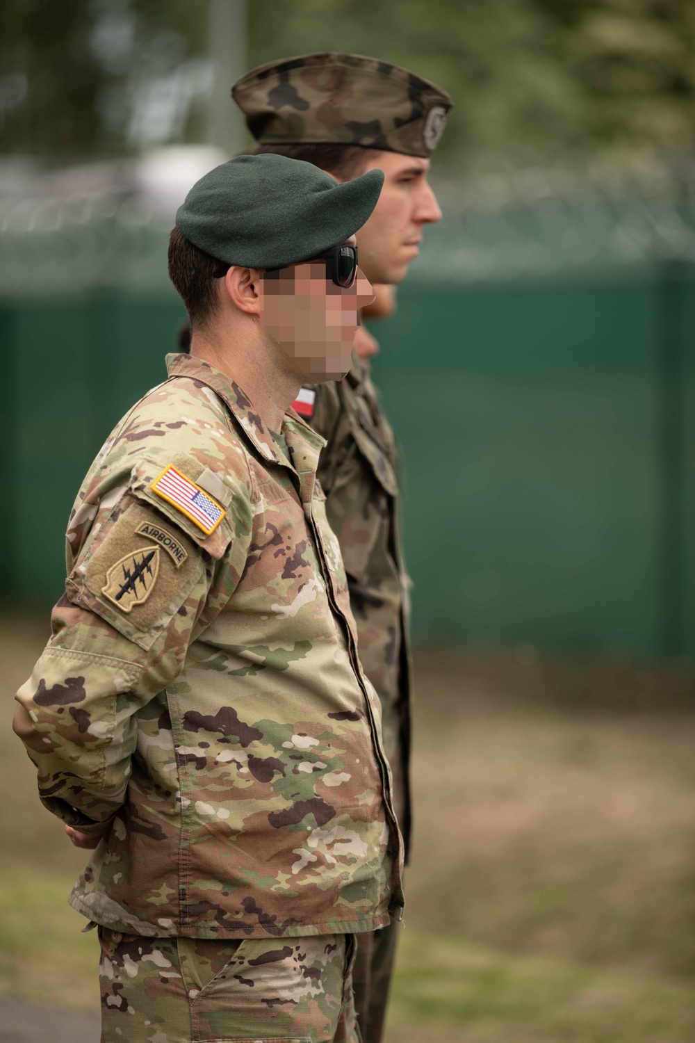 Dignitaries, members of 10th Special Forces Group (Airborne), Polish special forces, 6th Airborne Brigade, gather for the renaming of Camp Miron, May 17, 2024 near Krakow Poland.