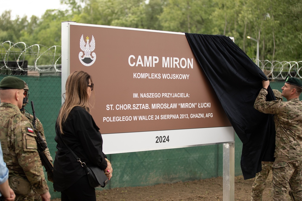 Dignitaries, members of 10th Special Forces Group (Airborne), Polish special forces, 6th Airborne Brigade, gather for the renaming of Camp Miron, May 17, 2024 near Krakow Poland.