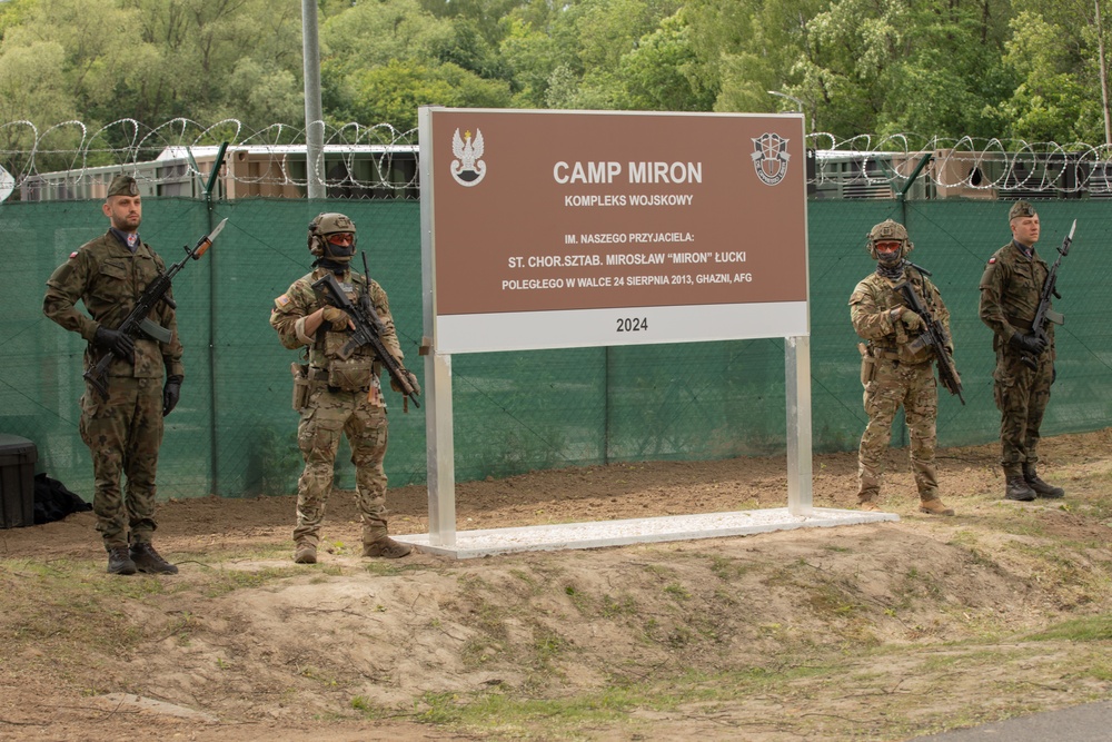 Dignitaries, members of 10th Special Forces Group (Airborne), Polish special forces, 6th Airborne Brigade, gather for the renaming of Camp Miron, May 17, 2024 near Krakow Poland.