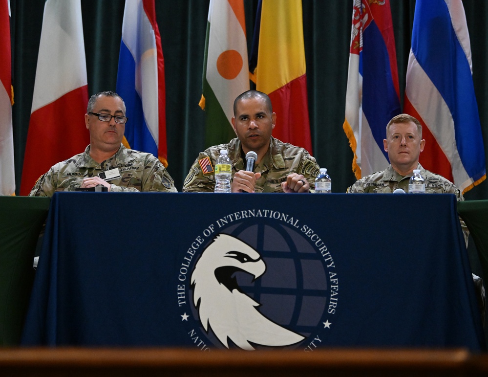 Colonel Nathan Whitfield, commander, 2nd Special Warfare Training Group (Airborne), U.S. Army John F. Kennedy Special Warfare Center and School, speaks during the Spring Symposium/Irregular Warfare Forum