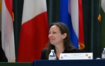 Dr. Carolyne Davidson, College of International Security Affairs-Fort Liberty, listens to a question during a QandA during the 2024 Irregular Warfare Forum