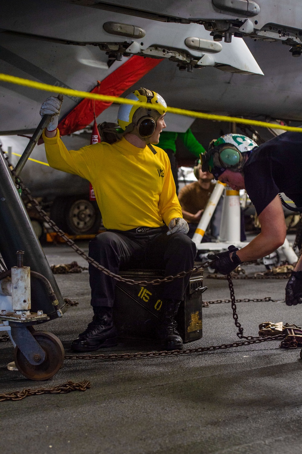 USS Ronald Reagan (CVN 76) Sailors conduct aircraft maintenance