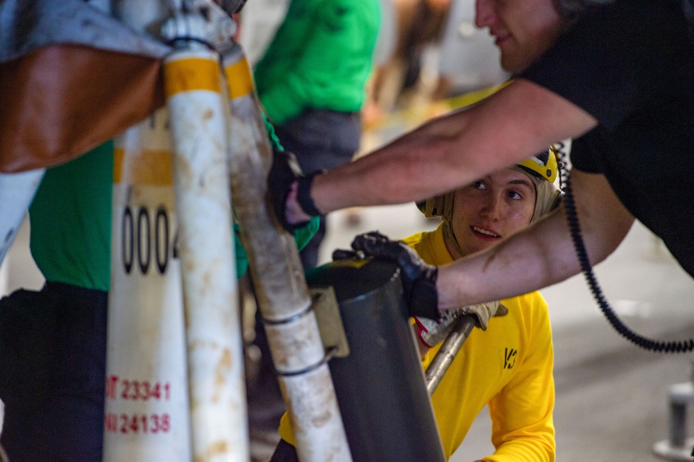 USS Ronald Reagan (CVN 76) Sailors conduct aircraft maintenance