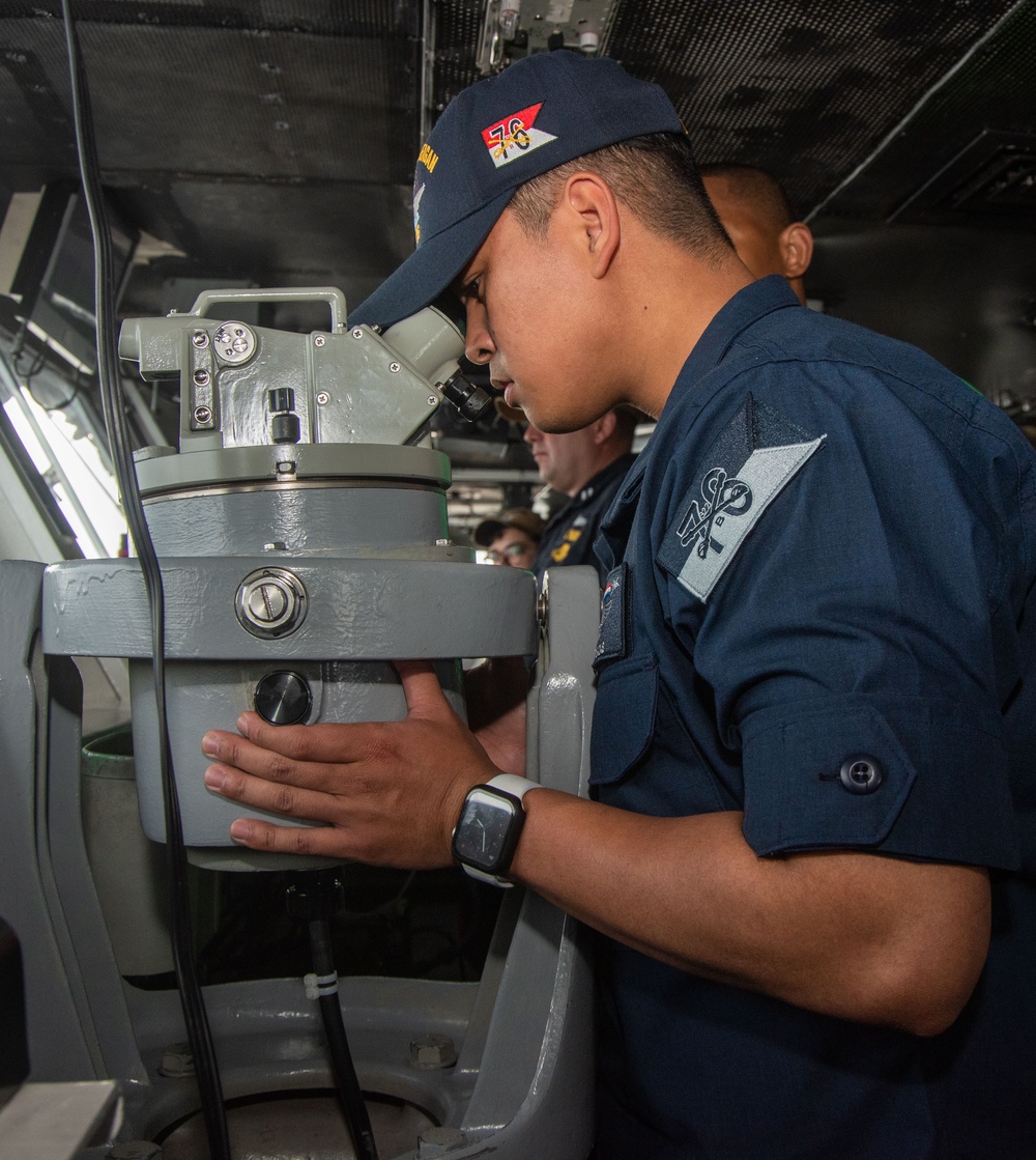 USS Ronald Reagan (CVN 76) Sailor receives Sailor of the Day award
