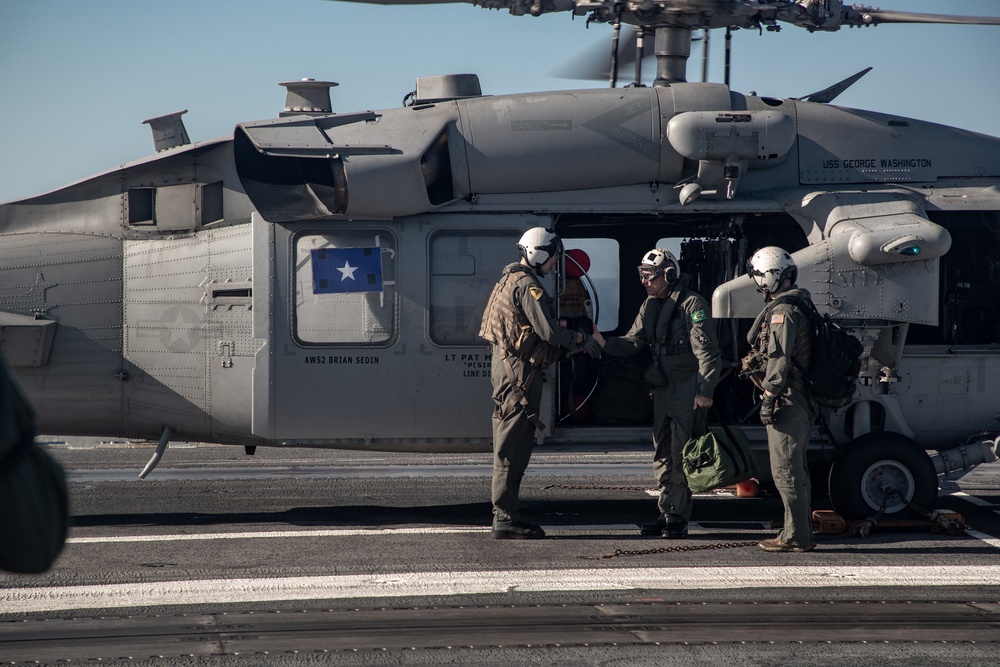 USS George Wahington hosts Brazilian Navy Rear Adm. Emerson Gaio