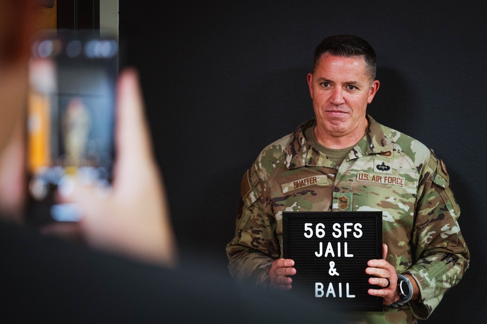 Behind bars: 56th SFS hosts Jail and Bail charity drive