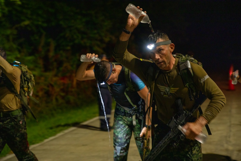 Competitors take part in Fuerzas Comando 2024 Night Ruck March