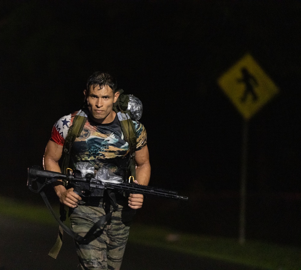 Competitors conduct Fuerzas Comando 24 Night Ruck March
